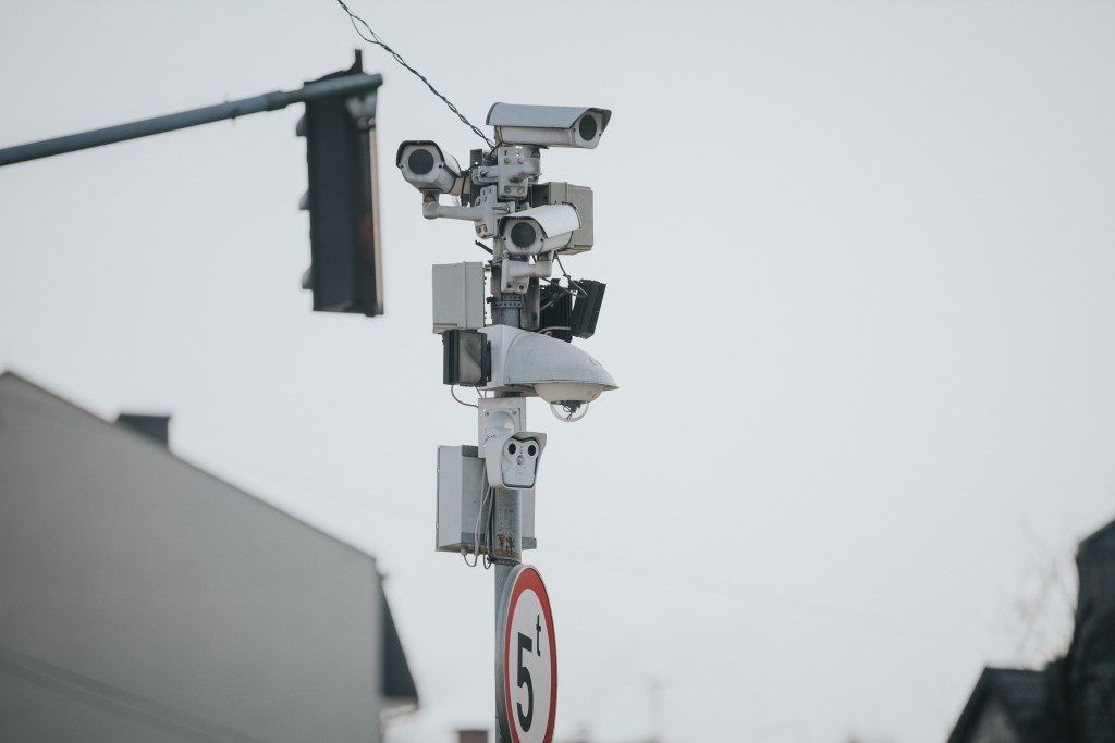 shallow focus shot multi angle traffic cameras street pole