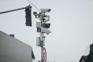 shallow focus shot multi angle traffic cameras street pole