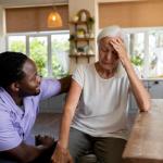 social worker helping senior woman